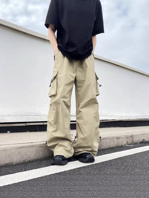 Khaki cargo sweatpants with multiple pockets and adjustable drawstring hems.