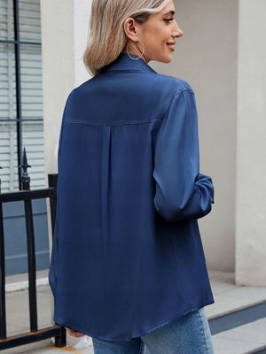 Navy utility crepe shirt with tie detail, long sleeves rolled up.