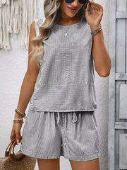 Black and white striped maternity set with a sleeveless top and drawstring shorts.