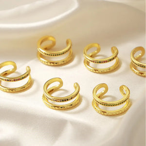 Double band ring with pavé multicolor stones and textured detail.