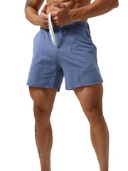Dusty blue lounge shorts with raw edge seams and drawstring waist