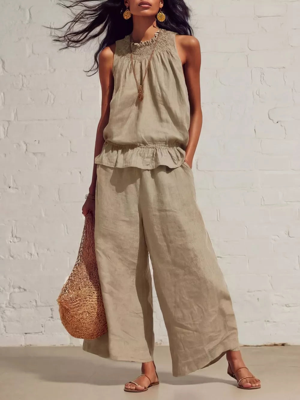 Khaki smocked peplum top and flowing pants set with ruffled hem and wide legs.