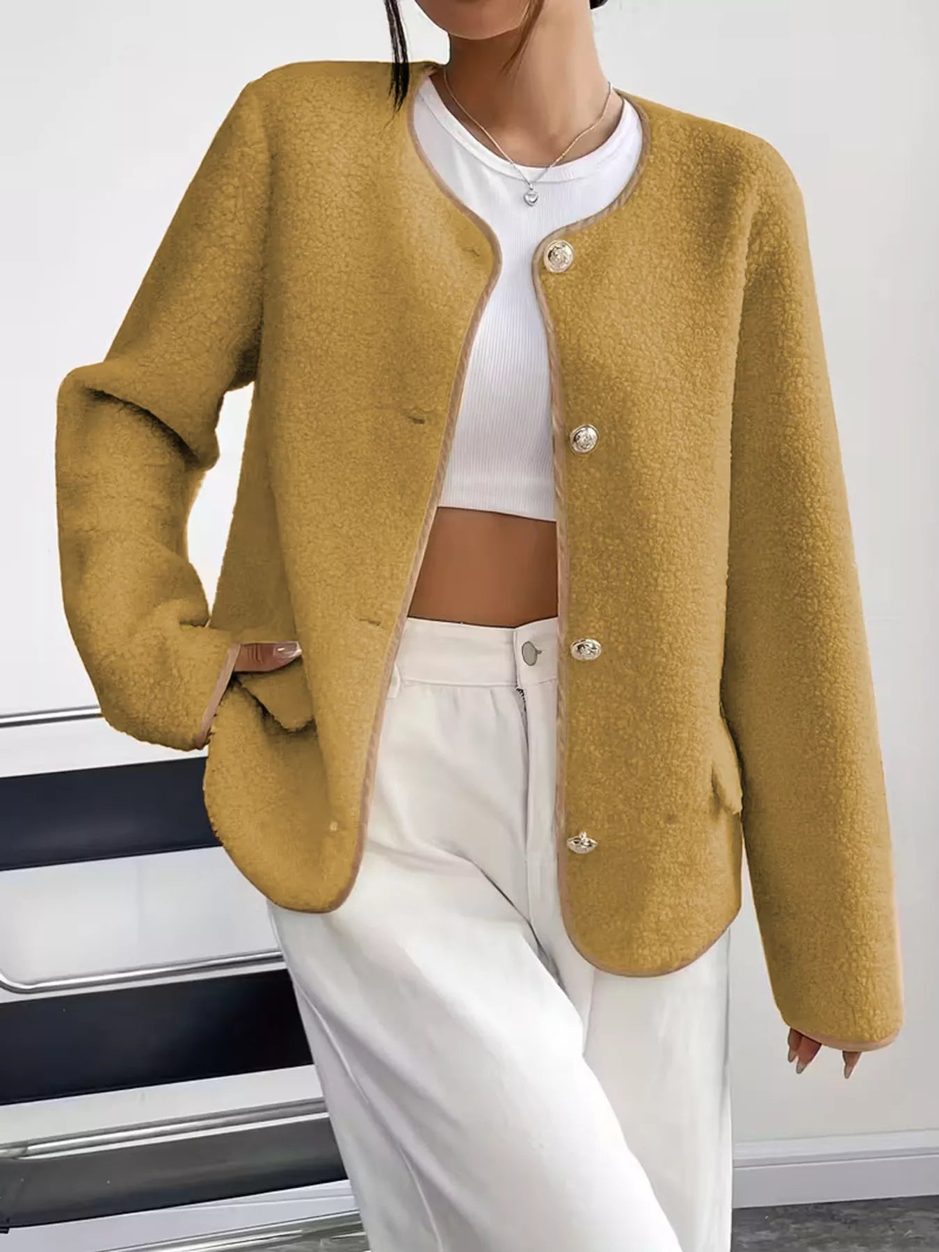 Textured button-up fleece jacket in Khaki with round neckline and decorative buttons.