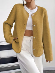 Textured button-up fleece jacket in Khaki with round neckline and decorative buttons.