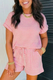 Pink striped textured knit two-piece set with drawstring shorts and short sleeve top.