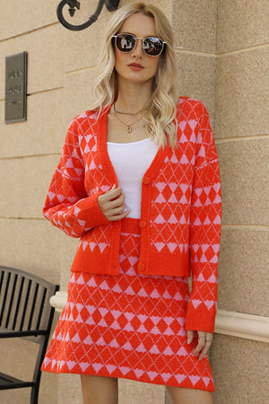 Orange argyle knit cardigan and mini skirt set with button front and V-neck.