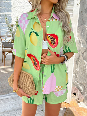 Coastal Tile Print Co-ord Set in lime green with fruit and checkered patterns, button-up shirt and shorts.