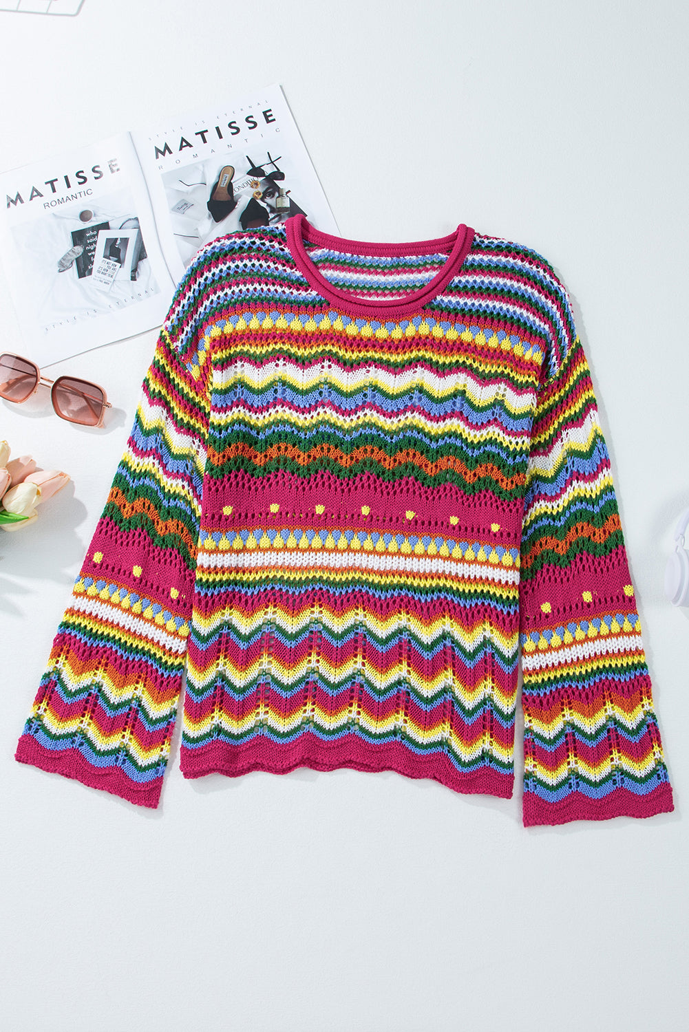 Multicolor crochet wave knit sweater with bell sleeves and a round neckline.