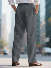 Men's grey pinstripe sweatpants with a wide-leg cut and back pocket.