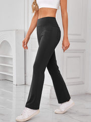 Black flared leg activewear pants with pocket detail