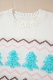 White knit sweater with textured tree motif and chevron pattern.