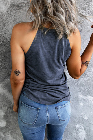 Dark navy halter tank top with a patriotic bow print, styled with jeans.