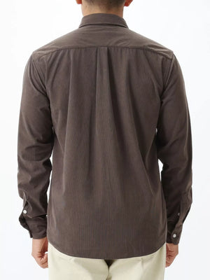 Brown long sleeve buttoned shirt with back pleats and subtle vertical texture.