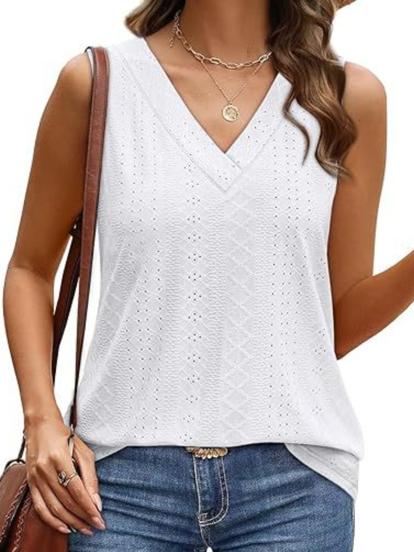 White eyelet V-neck sleeveless tank top with a diamond pattern.