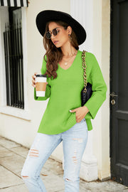 Relaxed fit v-neck knit pullover in yellow-green with long sleeves and a relaxed cut.