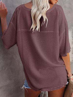 Waffle knit relaxed v-neck t-shirt in maroon with short sleeves.