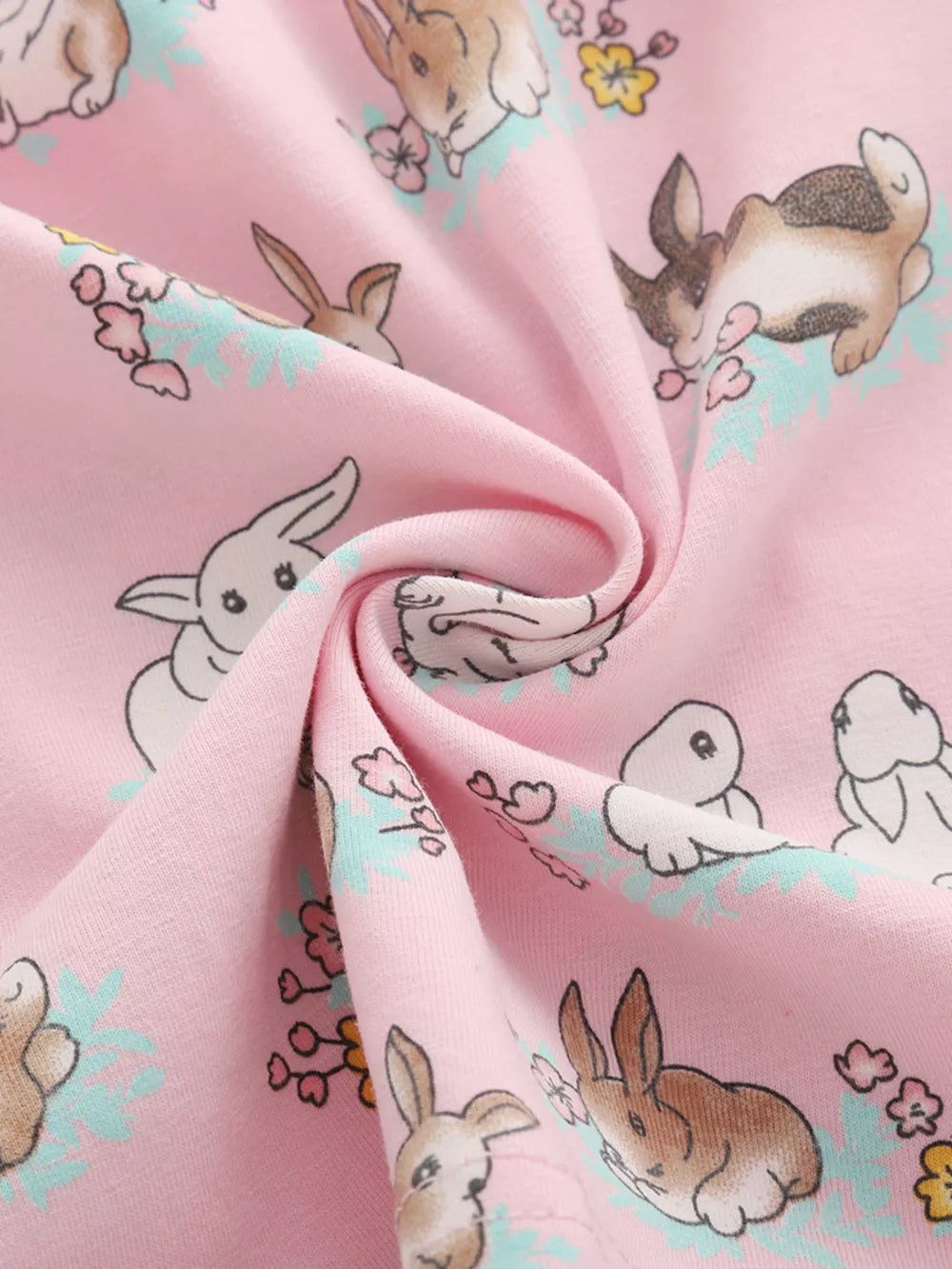 Pink cotton toddler dress with a cute bunny print and floral accents.