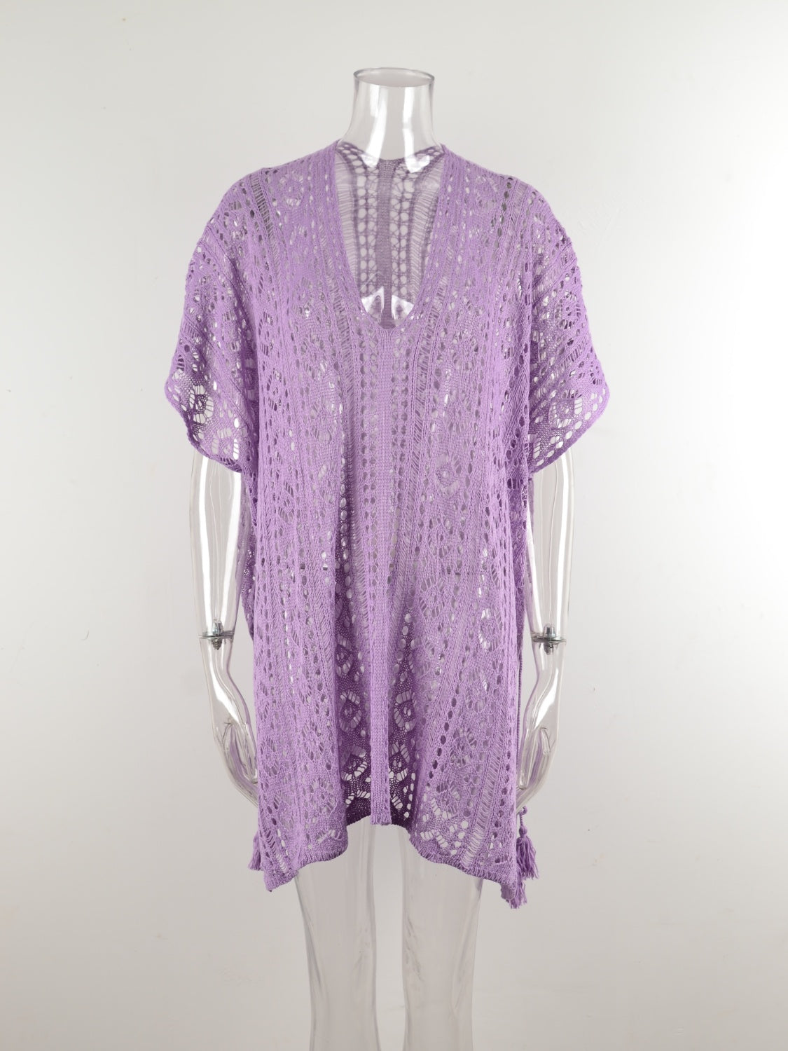 Lavender open-knit V-neck beach cover-up with short sleeves and a tasseled hem.