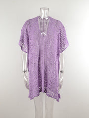 Lavender open-knit V-neck beach cover-up with short sleeves and a tasseled hem.