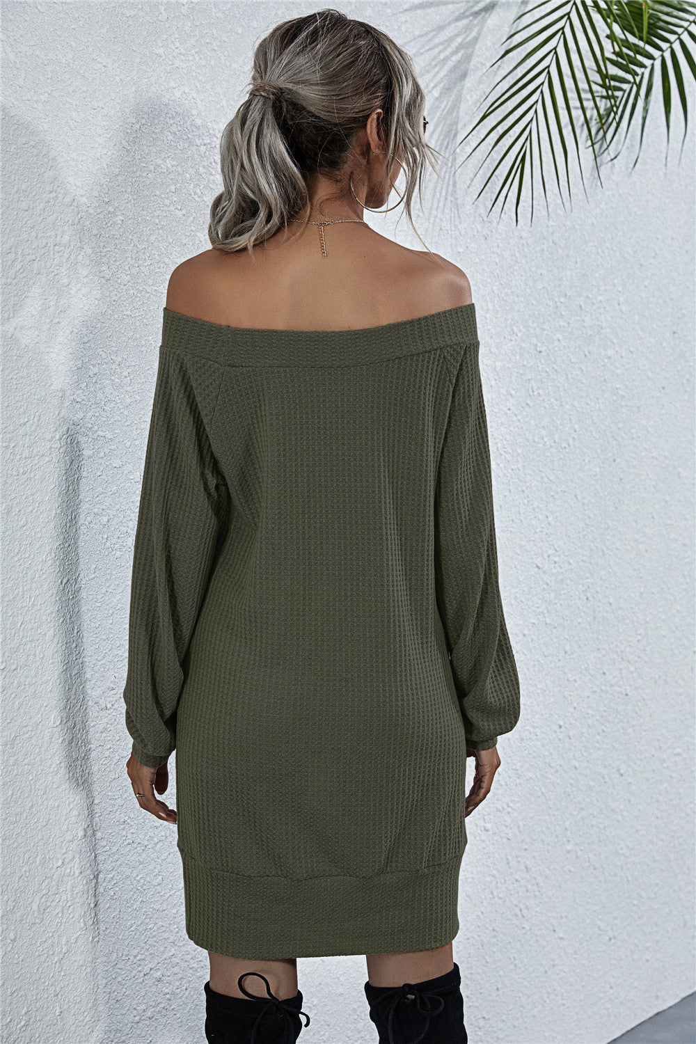 Army green waffle knit off-shoulder mini dress with long sleeves.