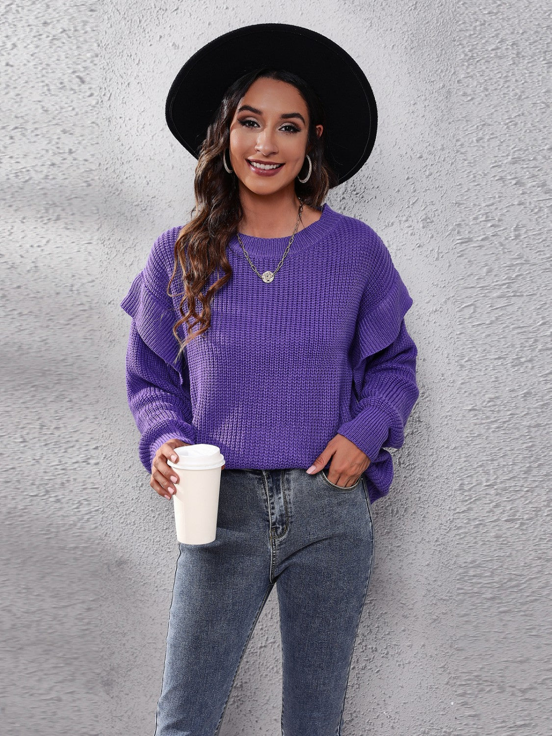 Violet ribbed knit pullover sweater with ruffled sleeves and crew neck.