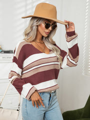 Wide stripe v-neck knit sweater in wine and cream acrylic with long sleeves.