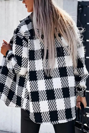 Textured checkerboard overshirt in plaid with button front and long sleeves.