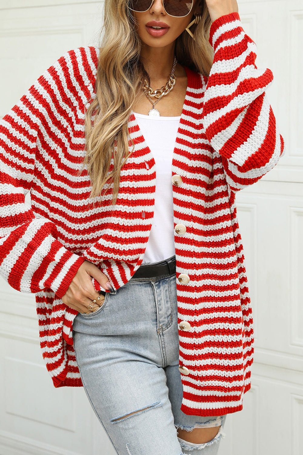Bold stripe balloon sleeve cardigan in deep red and white acrylic, buttoned front, casual style.