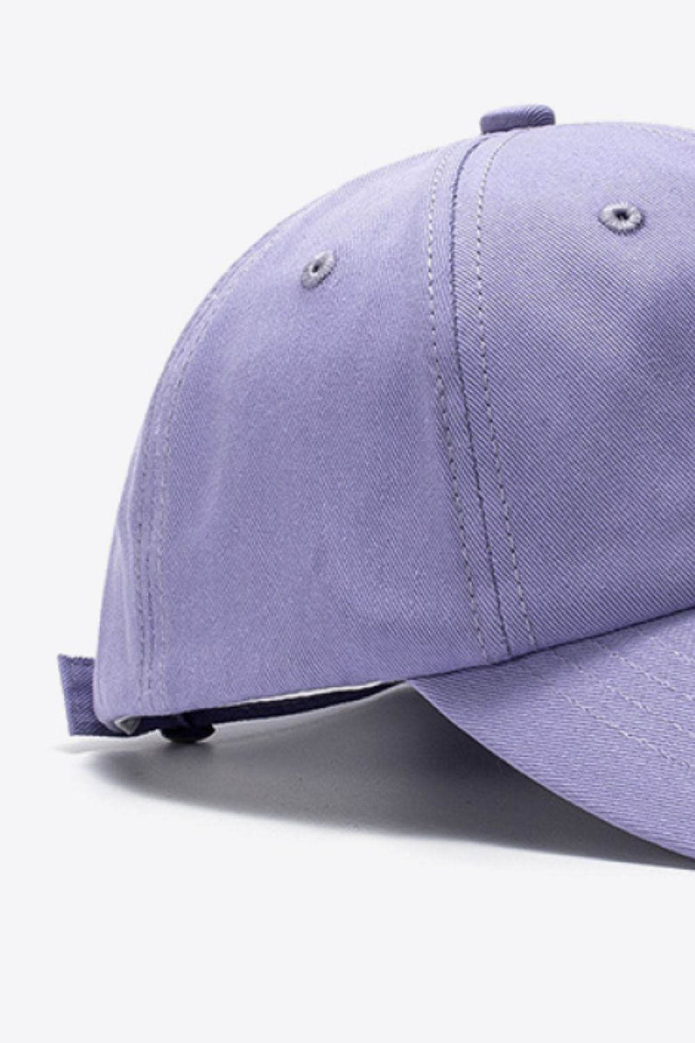 Purple cotton baseball cap with adjustable strap detail
