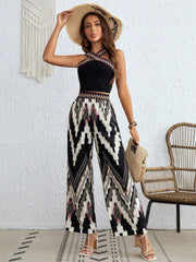 Black geometric print crossover crop top and wide leg pants set