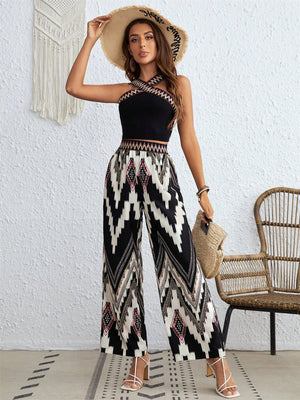 Black geometric print crossover crop top and wide leg pants set