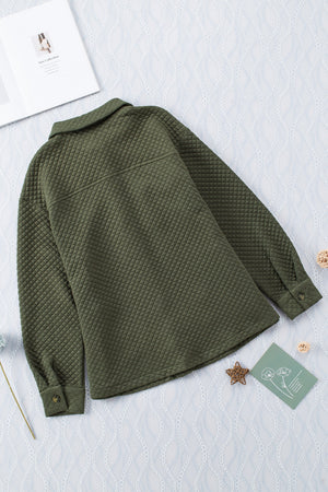 Army green quilted overshirt with button-down front and patch pockets.