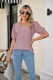 Perforated puff sleeve v-neck top in pink purple with eyelet detail.