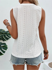 White eyelet sleeveless top with diamond pattern detail.