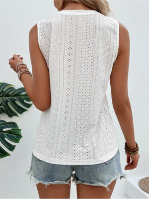 White eyelet sleeveless top with diamond pattern detail.