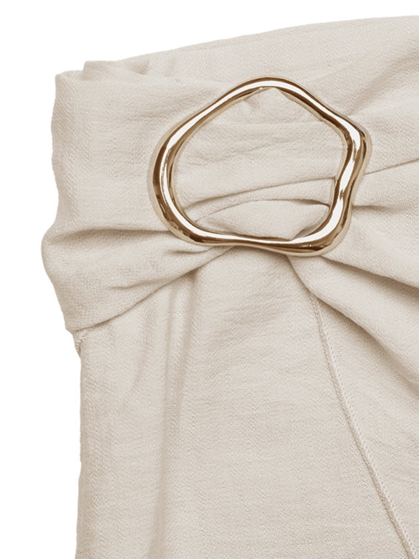 Cream mini skirt with knotted detail and gold buckle accent
