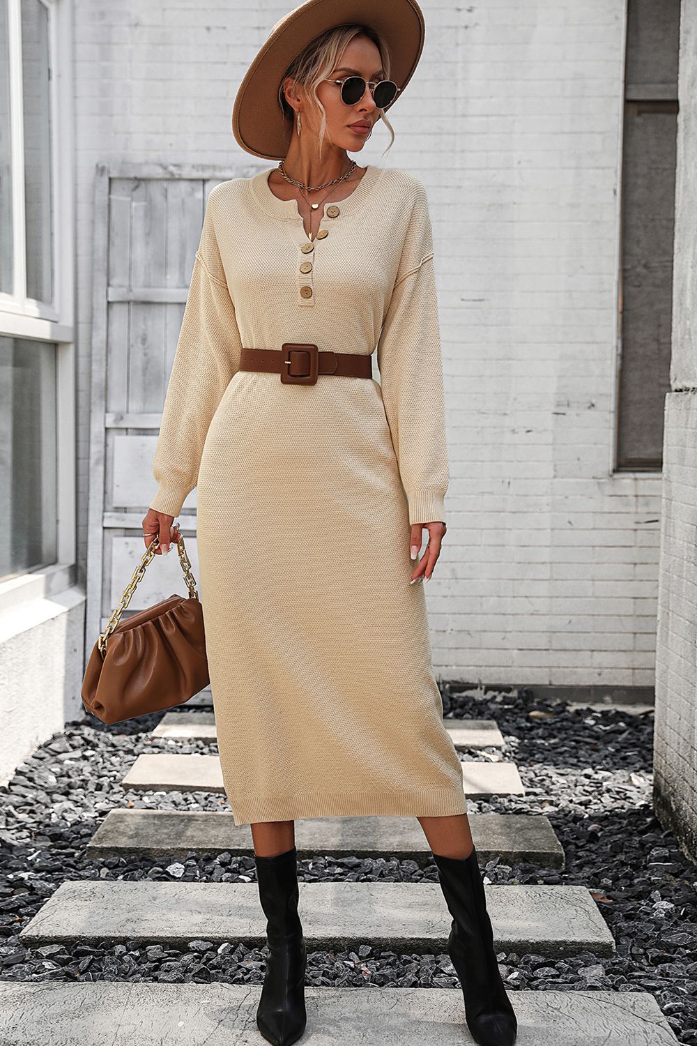 Beige textured knit henley midi dress with button detail and long sleeves.