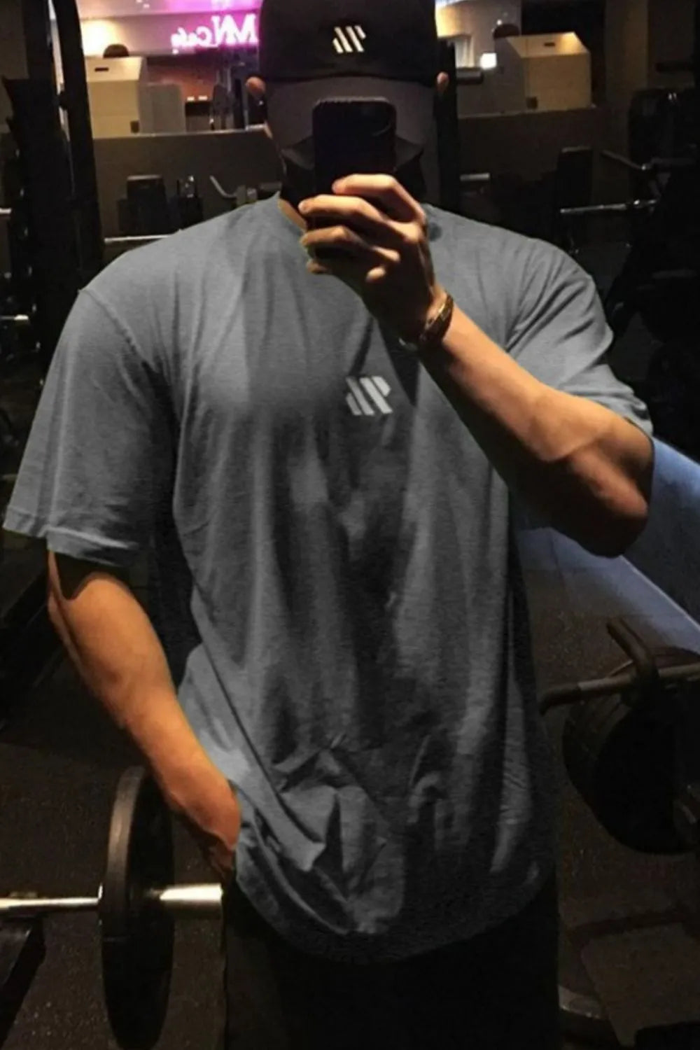 Logo Detail Oversized Tee in Dark Gray with a small white logo detail on the chest.