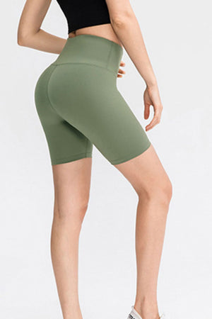 Army green high-waist performance bike shorts with a sculpted fit.