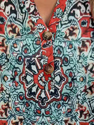 Americana Henley print top with button detail in red and blue paisley pattern.