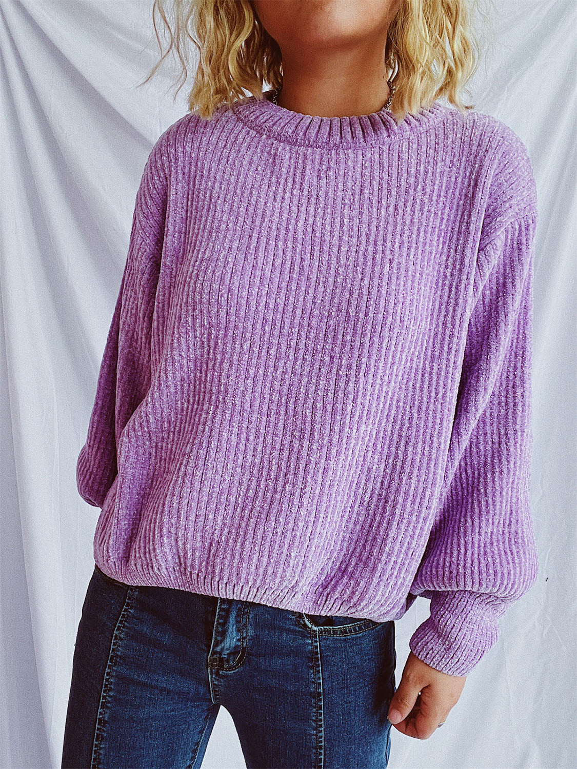 Relaxed crewneck pullover sweater in Lavender with textured ribbed knit and long sleeves.