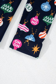 Navy blue lounge set with festive bauble print, featuring "HO HO" text detail.