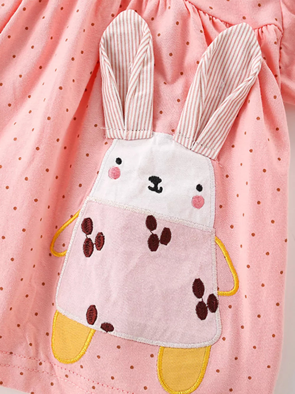 Pink cotton toddler bubble shorts set with brown polka dots and a bunny applique.