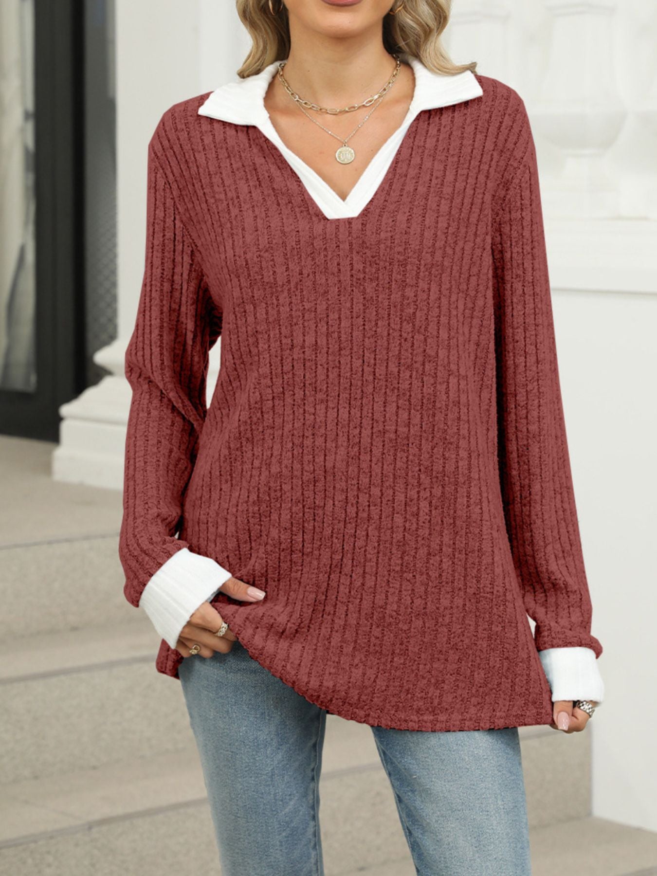 Ribbed knit long sleeve t-shirt in Rust Red with white collar and cuffs, V-neck.