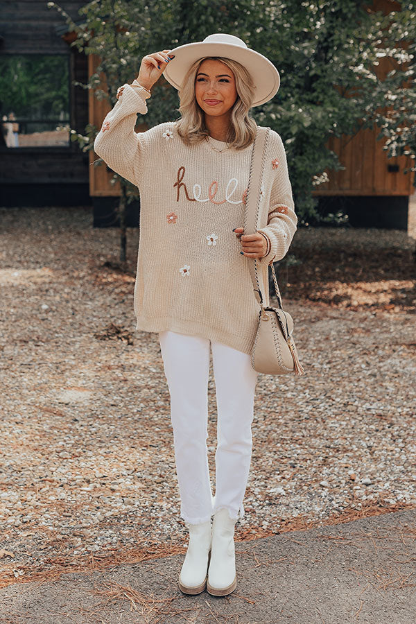 Hello Embroidered Floral Knit Sweater in Khaki with "hello" graphic and floral details.