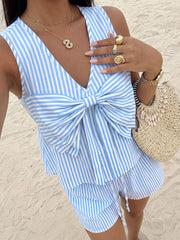 Blue and white striped two-piece set with a large bow detail on the top and tiered shorts.
