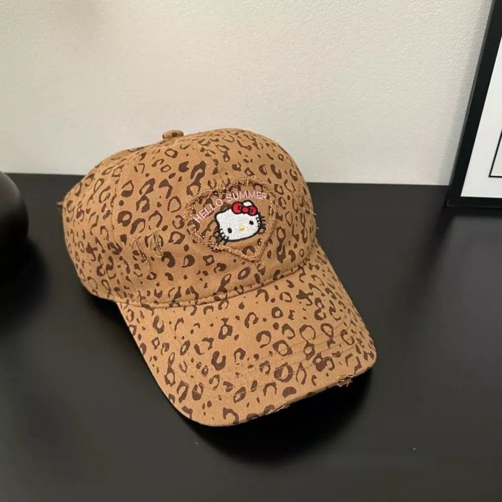 Tan leopard print baseball hat with Hello Kitty embroidery and "Hello Summer" text.