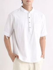 White short sleeve button-down shirt with mandarin collar and chest pocket.