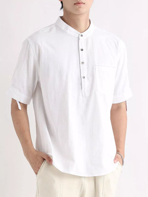 White short sleeve button-down shirt with mandarin collar and chest pocket.