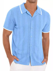 Blue textured knit polo shirt with white contrast trim and short sleeves.